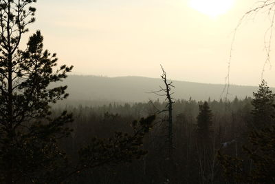 Scenic view of mountains against sky during sunset