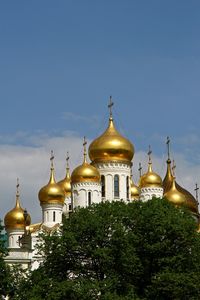 View of illuminated building against sky