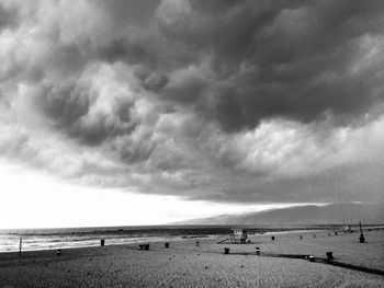 Scenic view of sea against cloudy sky