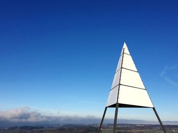 View of landscape against clear blue sky