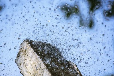 Full frame shot of raindrops on window