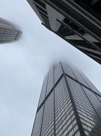 Low angle view of skyscraper against sky