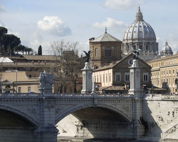 Arch bridge over canal in city