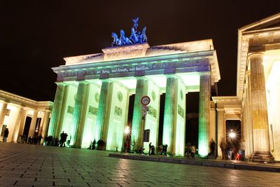 Low angle view of historical building at night