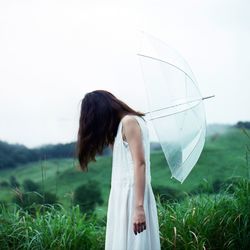 Woman standing on field