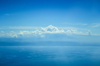 Scenic view of sea against blue sky