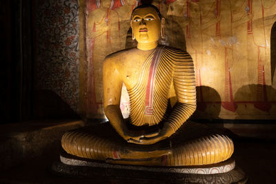 Statue of buddha in building