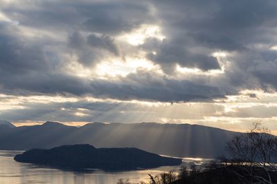 Scenic view of mountains against sky during sunset