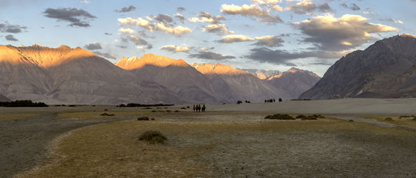 Scenic view of mountains against sky during sunset