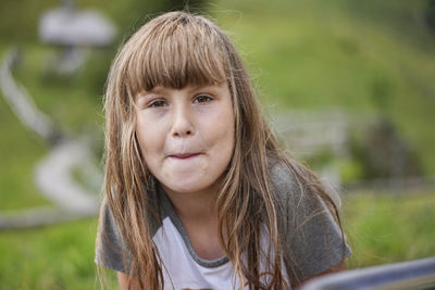 Portrait of girl with long brown hair