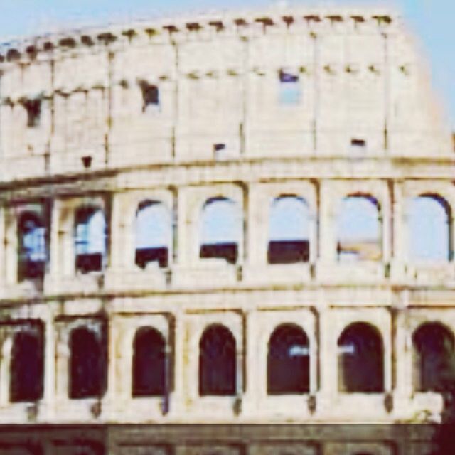 architecture, building exterior, built structure, low angle view, arch, window, history, sky, building, facade, day, outdoors, no people, clear sky, exterior, old, historic, architectural feature, the past, pattern