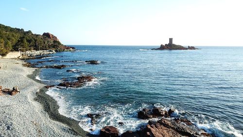 Scenic view of sea against clear sky