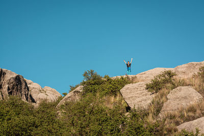 Scenic view of mountain against clear blue sky