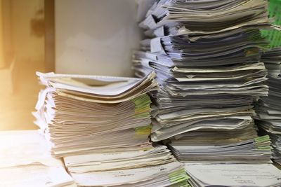 Close-up of stack of books on table