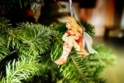 Close-up of christmas decoration hanging on tree