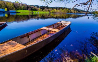 Boat moored in lake