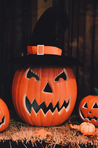 Close-up of pumpkin against orange background