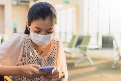 Young woman using mobile phone