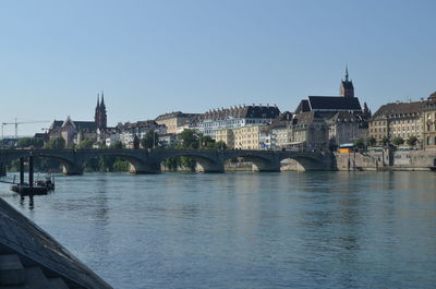 View of bridge over river in city