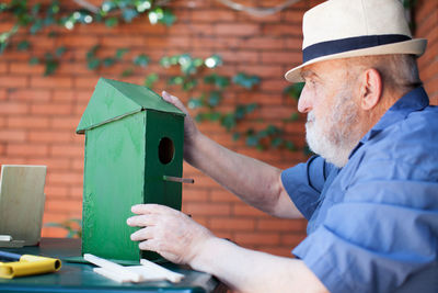 Portrait of man wearing hat