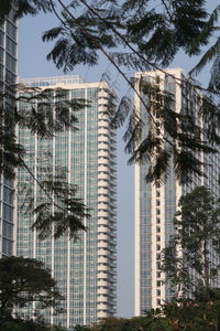 Low angle view of modern buildings against sky