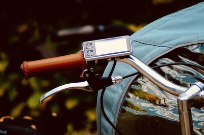 Close-up of bicycle on street