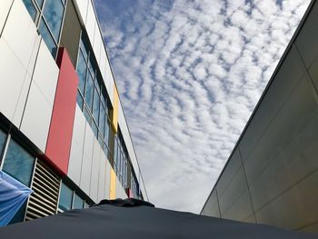 Low angle view of modern building against sky