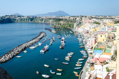 High angle view of boats in city