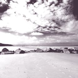 Scenic view of beach against sky