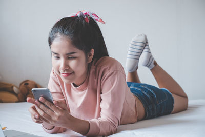Young man using mobile phone