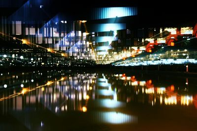 Reflection of illuminated buildings in water