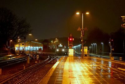 Illuminated street lights at night