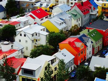 Houses in town against sky