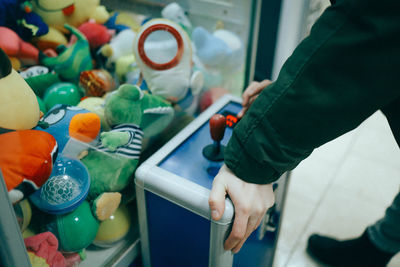 High angle view of hand holding bottle