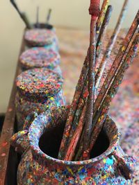 High angle view of paintbrushes in container