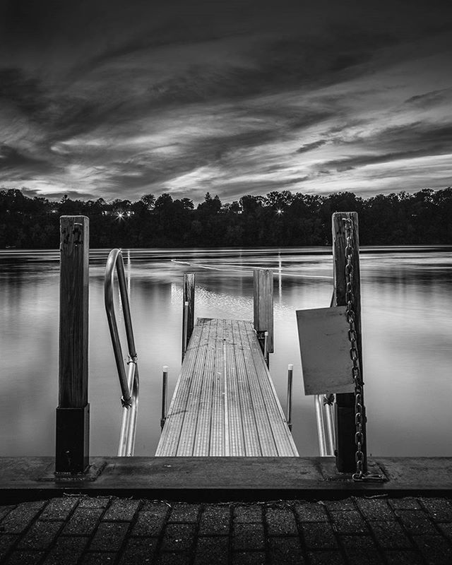 sky, cloud - sky, water, cloudy, empty, pier, tranquility, railing, lake, the way forward, cloud, absence, tranquil scene, nature, weather, built structure, wood - material, scenics, overcast, outdoors