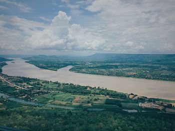High angle view of agricultural landscape against sky