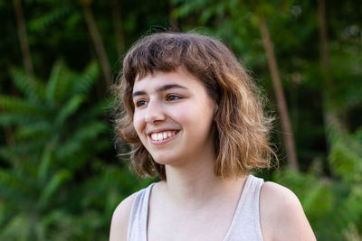 Portrait of smiling young woman