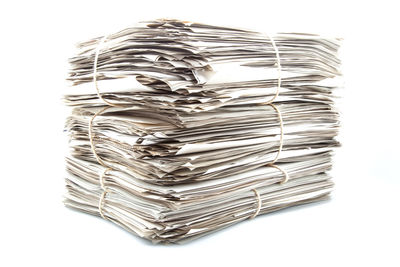 Close-up of stack against white background