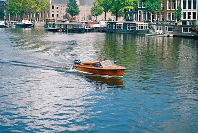 Boat moored at harbor