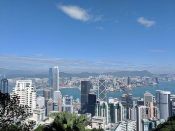 Modern buildings in city against sky