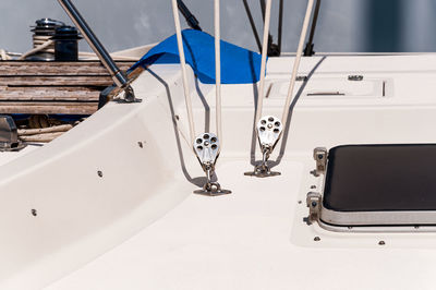 Close-up of boat deck moored at harbor