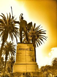 Low angle view of statue against sky
