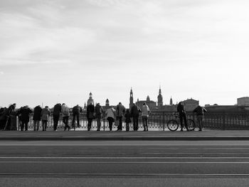 Group of people walking on road