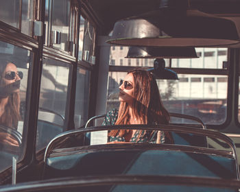 Woman sitting in bus