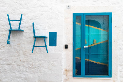 Closed blue door of building