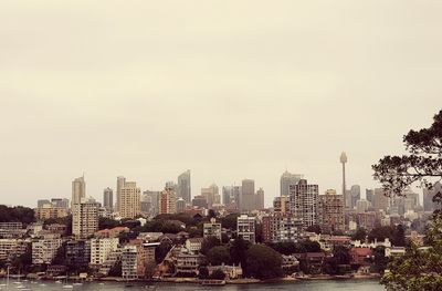 Buildings in city against sky