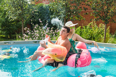 High angle view of woman in swimming pool