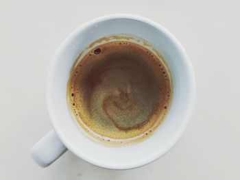 Directly above shot of coffee cup on table