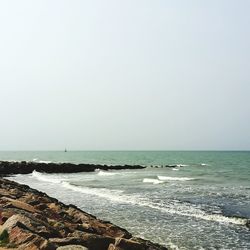 Scenic view of sea against clear sky